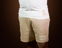 Load image into Gallery viewer, pozItive behaviŪr shorts-Tan